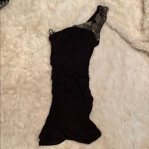 Body fitting one shoulder dress